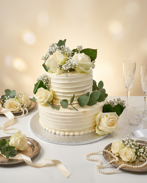 Two Tier White Ribbed Wedding Cake